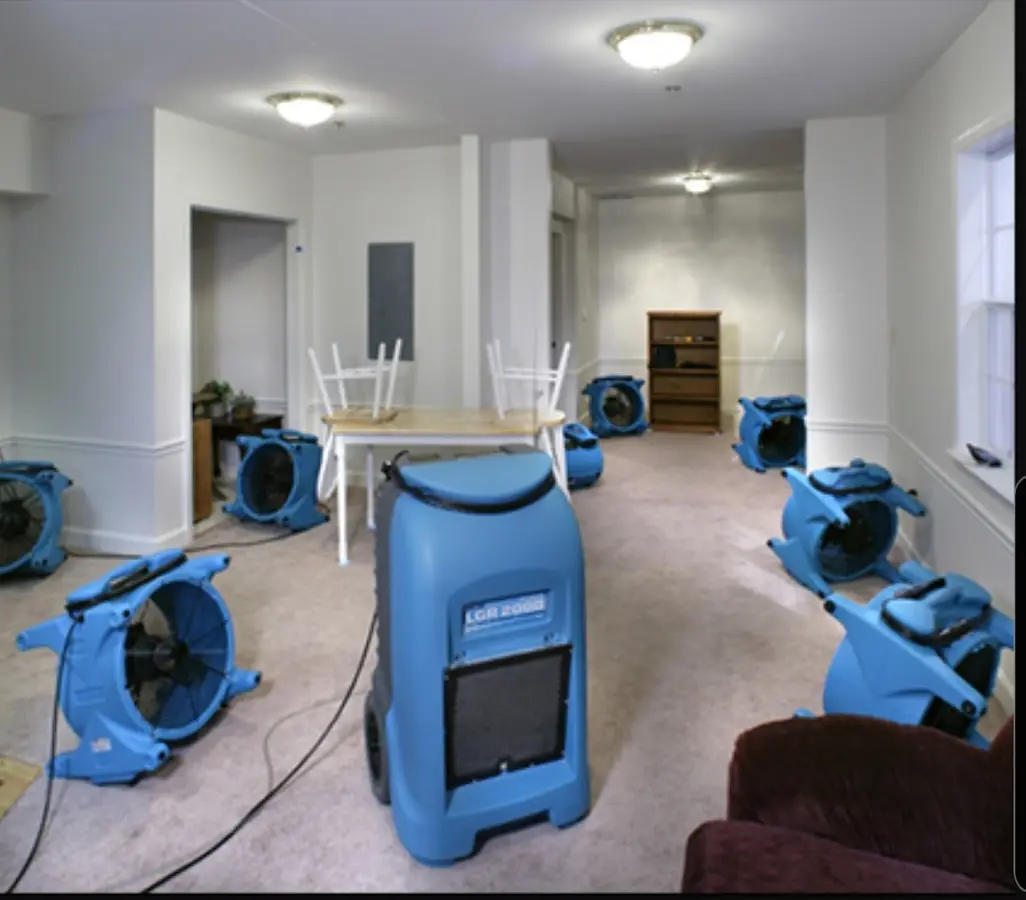 Air movers and dehumidifier setup for Water Damage Restoration in Iroquois Point